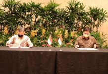 Menko Perekonomian Tandatangani Joint Report to the Leaders Bersama Menperindag Singapura