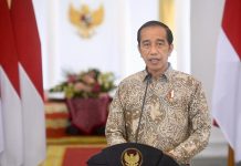 Presiden Jokowi Sampaikan Sambutan Pada Perayaan Natal Nasional Presiden Jokowi memberikan sambutan pada Perayaan Natal Nasional Tahun 2021, Senin (27/12/2021). (Foto: BPMI Setpres)