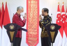 MenkumHam RI Bersama Menteri Hukum Singapura Tandatangani Ekstradisi Buronan Presiden RI Joko Widodo dan Perdana Menteri (PM) Singapura, Lee Hsien Loong, di The Sanchaya Resort Bintan, Kabupaten Bintan, Provinsi Kepulauan Riau, Selasa, (25/01/2022).