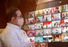 Pemerintah Lanjutkan PPKM Luar Jawa-Bali Hingga 14 Maret Seskab Pramono Anung mengikuti Ratas Evaluasi PPKM melalui konferensi video, Minggu (27/02/2022). (Foto: Humas Setkab/Jay)