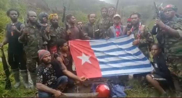 IMG-20221213-WA0021 FOTO: Salah satu tukang ojek helm merah jadi korban pembunuhan kelompok teroris KKB.