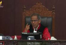 Wacana Pemilu Campuran, Wakil Ketua MK: Skotlandia Seperti itu Foto tangkap layar, Wakil Ketua MK Saldi Isra saat digelar sidang judicial review sistem pemilu proporsional terbuka. Selasa (9/5)