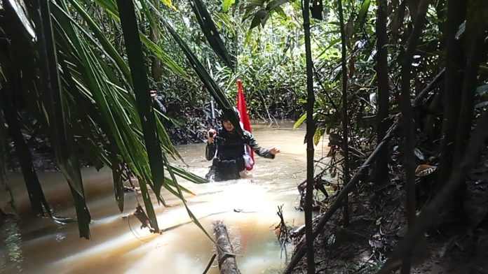 FOTO: Pos Scofro lama Satgas Pamtas RI-PNG Yonif 122/Tombak Sakti melaksanakan patroli patok MM 2.3 tepatnya di Wilayah Kabupaten Keerom, Papua.