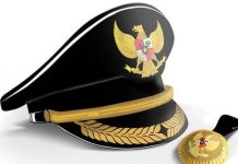 Kemendagri Tunjuk Junaedi Pj Bupati Jeneponto, Basrah Sidrap Ilustrasi topi dan pin jabatan. (DOK.RIAUPOS.CO)