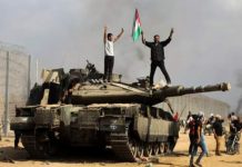 Serangan Dadakan Hamas, Tank Merkava Israel Hancur Dibom Menggunakan Drone Foto tangkap layar tank andalan Israel Merkava saat dikuasai pasukan Hamas.