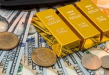 Dugaan Korupsi di PT Antam Capai Rp5,9 Kuadriliun, ini Penjelasan Kejagung ILUSTRASI: Batangan Emas dan Mata Uang Dolar AS