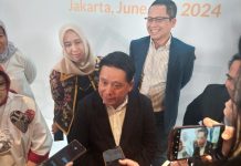 Dirut BSI Sepertinya Tak Ambil Pusing Soal PP Muhammadiyah Tarik Dana Senilai Rp 13 Triliun FOTO: Direktur Utama BSI Hery Gunardi dalam konferensi pers BSI International Expo 2024 di Jakarta, Jumat (14/6). (Foto: Galih Pratama)