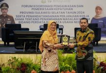 Kejati Sulsel dan BPJS Kesehatan Wilayah IX Tandatangani MoU FOTO: Kiri Deputi Direksi BPJS Kesehatan Wilayah IX Dr. Yessi Kumalasari, MPH. AAAK dan Kajati Sulsel Agus Salim (Dok. PENKUM Kejati Sulsel)