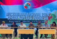 Jadi Pimpinan Sidang Munas Dekopin, Aldin Bulen: Priskhianto Terpilih Ketua Umum FOTO: Drs H. Aldin Bulen, SH, MH Tengah Batik Coklat saat memimpin sidang Munas Dekopin di Jakarta. (Istimewa)