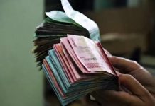Sebanyak 3979 Guru Madrasah di Sulsel dapat Rapelan TPG Jelang Idulfitri FOTO: Ilustrasi pencairan THR TPG 100 Persen. (Mufid Majnun/Unsplash)
