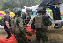 Guru Jadi Korban Kekerasan di Wilayah Konflik ini Kata Aliansi Demokrasi untuk Papua FOTO: Anggota Satgas Koops TNI Habema Kogabwilhan III mengevakuasi jenazah guru korban serangan kelompok Tentara Pembebasan Nasional Papua Barat Organisasi Papua Merdeka (TPNPB OPM) di Distrik Anggruk, Kabupaten Yahukimo, Papua Pegunungan, Minggu (23/03). (ANTARA FOTO/HO-Dispenad)