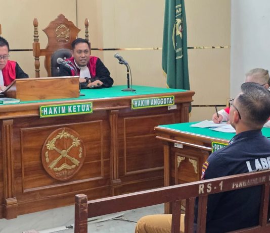 Dugaan Dosen Bunuh Suami, Keterangan Ahli Sinkron Dengan Para Saksi FOTO: Keterangan saksi ahli personel Bid Labfor Poldasu, Kompol Rafles Tampubolon di PN Medan dalam perkara dugaan pembunuhan terhadap Rusman Maralen Situngkir.