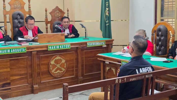 IMG-20250506-WA0005 FOTO: Keterangan saksi ahli personel Bid Labfor Poldasu, Kompol Rafles Tampubolon di PN Medan dalam perkara dugaan pembunuhan terhadap Rusman Maralen Situngkir.