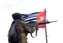 Gelar Operasi Tempur Lawan Militer Indonesia, TPNPB Keluarkan 8 Ultimatum FOTO: Salah satu anggota Tentara Pembebasan Nasional Papua Barat (TPNPB) Kodap III Ndugama Derakma. (Properti via Facebook Egianus Kogoya Jr)