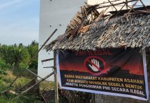 Masyarakat Asahan Menolak Aktivitas Pekerja Migran Indonesia Diduga Ilegal di Wilayah Mereka FOTO: Salah satu spanduk yang beredar menolak Aktivitas Pekerja Migran Indonesia Diduga Ilegal di Wilayah Mereka