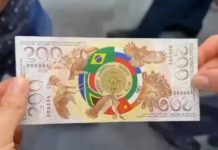 Mata Uang Hinga Rencana BRICS Bikin New Development Bank, Bakal Bersaing dengan IMF dan World Bank FOTO: Sebuah gambar uang kertas pecahan 200 dengan simbol negara-negara anggota BRICS beredar luas di media sosial bertepatan dengan pelaksanaan KTT BRICS 2025 di Brasil. FOTO/X