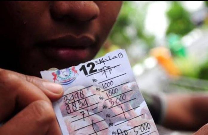 FOTO: Ilustrasi Pelaku Kupon Putih alias Togel (Properti via Google)