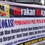 Menolak Proyek Pengolahan Sampah di Parangloe, Tamalanrea FOTO: Spanduk penolakan pembangunan rencana pembangunan Pengelolaan Sampah Menjadi Energi Listrik (PSEL) oleh warga di Kelurahan Mula Baru dan Kampung Tammalalang Kecamatan Tamalanrea, Kota Makassar, Sulawesi Selatan. Selasa (29/7)