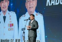 Bobby Serahkan DBH Rp 674 Miliar ke 33 Kabupaten-Kota di Sumut FOTO: Gubernur Sumatera Utara (Sumut) Bobby Nasution menyerahkan Dana Bagi Hasil (DBH), Sebesar Rp.674 miliar diserahkan ke kepala daerah kabupaten kota di Sumut. (Properti via Facebook Bobby Nasution)
