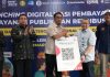 Mendagri Minta Gubernur BI Buat Sistem Pembayaran Pajak dan Retribusi Daerah Seragam seperti QRIS FOTO: Kiri Wali Kota Makassar, Dirut PD Pasar dan meluncurkan program Digitalisasi Pembayaran Layanan Publik dan Retribusi dengan sistem QRIS di Pasar Niaga Daya, Senin (28/7). (Properti via Fajar.co.id)