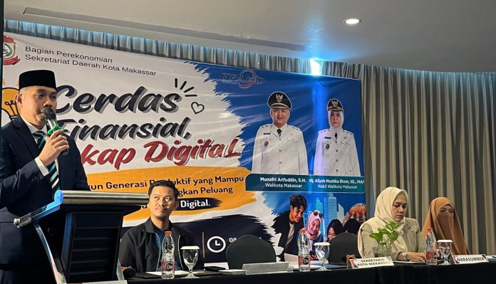FOTO: Kepala Bagian Perekonomian Sekretariat Daerah Kota Makassar, Muhammad Amri saat literasi dan inklusi keuangan masyarakat melalui kegiatan Literasi dan Inklusi Keuangan Tahun 2026 bertema “Cerdas Finansial, Cakap Digital” yang digelar di Hotel Melia Makassar, Selasa (23/6/2026). FOTO: Kepala Bagian Perekonomian Sekretariat Daerah Kota Makassar, Muhammad Amri saat literasi dan inklusi keuangan masyarakat melalui kegiatan Literasi dan Inklusi Keuangan Tahun 2026 bertema “Cerdas Finansial, Cakap Digital” yang digelar di Hotel Melia Makassar, Selasa (23/6/2026).