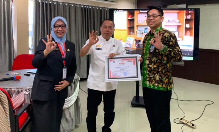 Ket Foto: Hj. Andi Syarifah Muhaeminah, S.E., M.Si., Plt. Kepala DPMD Luwu Utara (Ibu Berjilbab, Ist*)